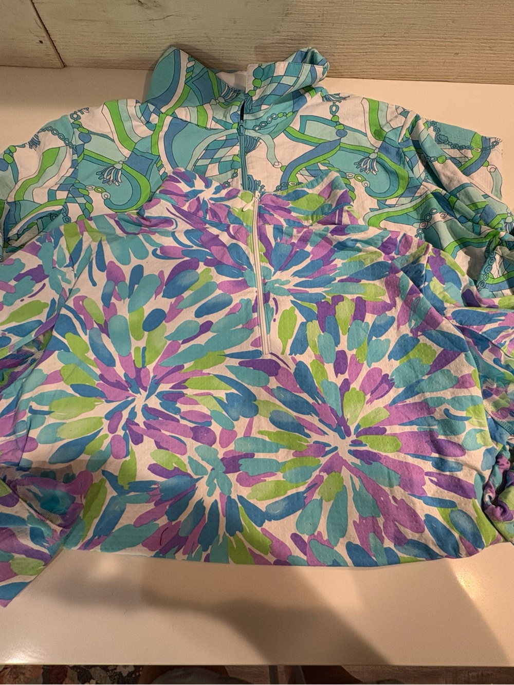 Four IBKUL women’s quarter zip